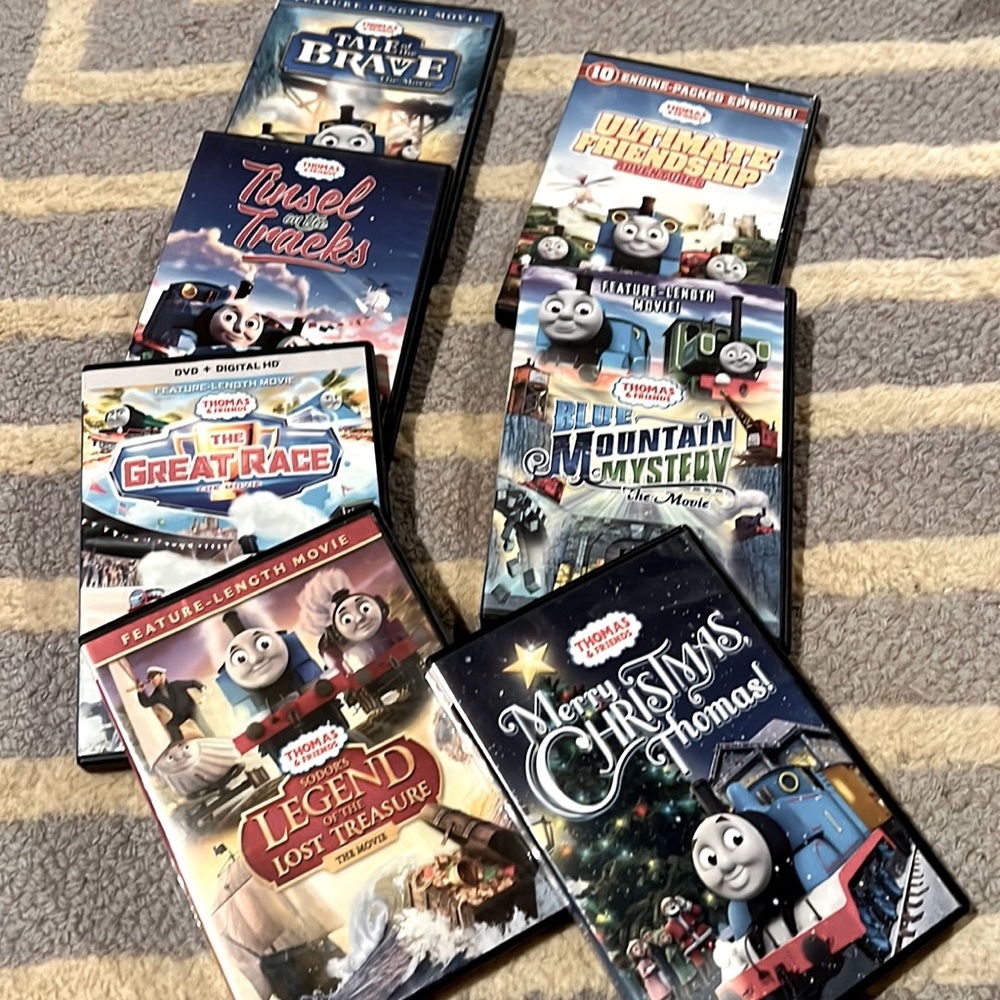 7 working Thomas the train DVDs!